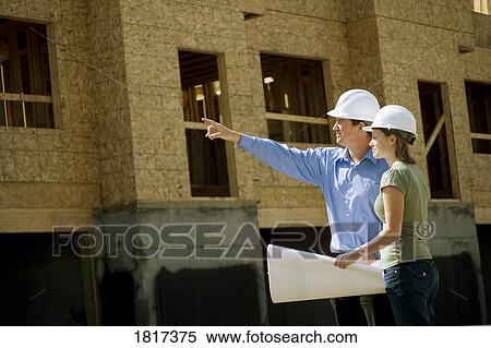 Looking at a new project being constructed View Large Photo Image Stock Photography - Looking at a new project being constructed. Fotosearch