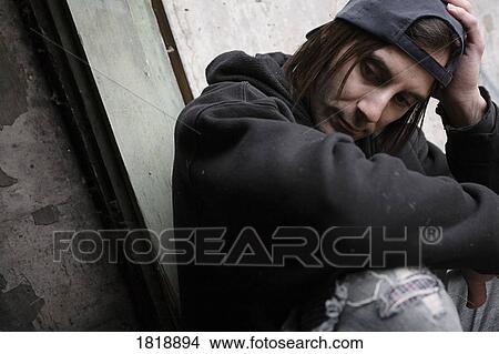 Man in worn out clothing View Large Photo Image Picture - Man in worn out clothing. Fotosearch