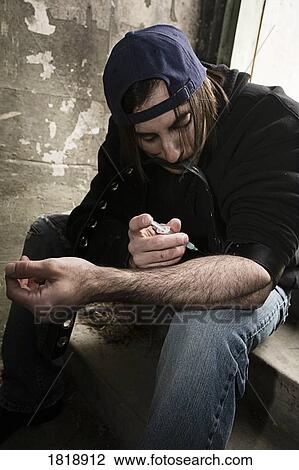 Man injecting drugs View Large Photo Image Stock Image - Man injecting drugs. Fotosearch