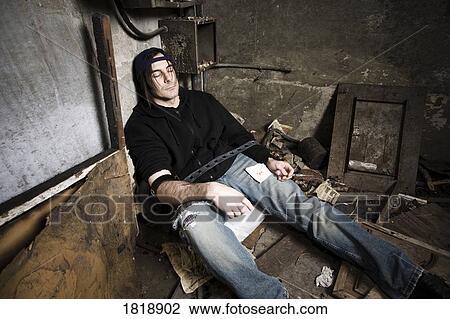 Stock Image - Man using drugs. Fotosearch