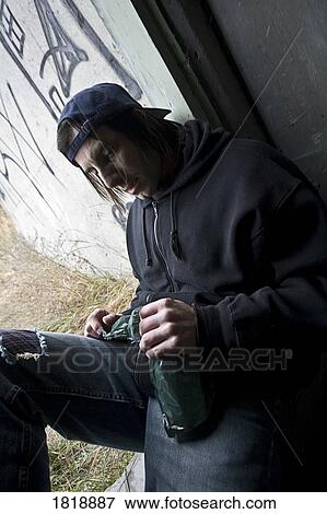 Man with bottle of alcohol View Large Photo Image Stock Photo - Man with bottle of alcohol. Fotosearch