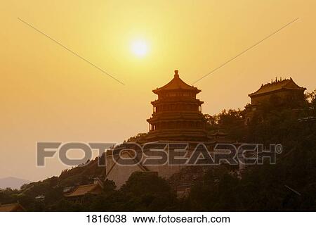 Pagoda in Summer Palace at sunset in Beijing, China View Large Photo Image Stock Photo - Pagoda in Summer Palace at sunset in Beijing, China . Fotosearch