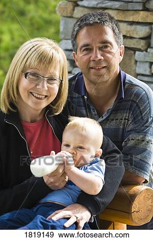 Parents with child View Large Photo Image Stock Photo - Parents with child. Fotosearch