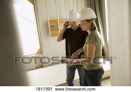 Stock Photo - People at work. Fotosearch