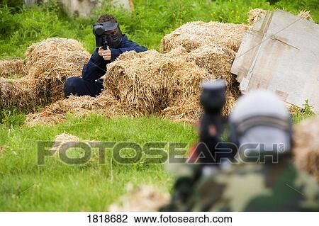 People playing paintball View Large Photo Image Stock Image - People playing paintball. Fotosearch