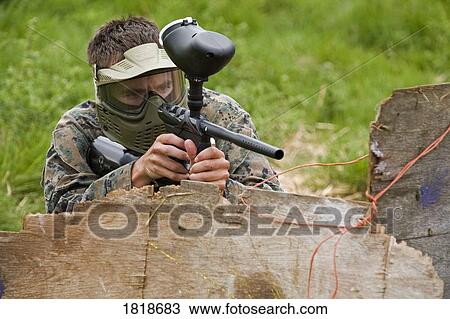 Person playing paintball View Large Photo Image Stock Image - Person playing paintball. Fotosearch