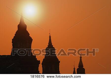 Silhouette of Stupa Temple at sunrise in Bagan, Myanmar, Burma View Large Photo Image Stock Photograph - Silhouette of Stupa Temple at sunrise in Bagan, Myanmar, Burma. Fotosearch