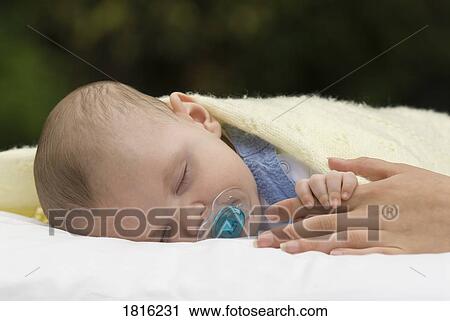 Sleeping baby View Large Photo Image Stock Image - Sleeping baby. Fotosearch