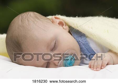 Stock Image - Sleeping like a baby. Fotosearch