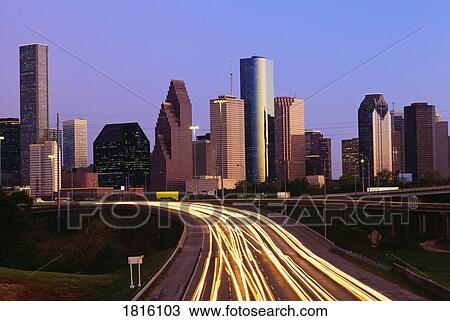 Streaking car lights at dusk and downtown Houston View Large Photo Image Stock Image - Streaking car lights at dusk and downtown Houston . Fotosearch