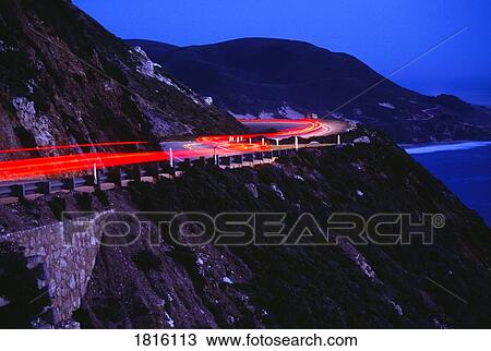 Streaking car lights on mountain road, California, USA View Large Photo Image Stock Image - Streaking car lights on mountain road, California, USA. Fotosearch