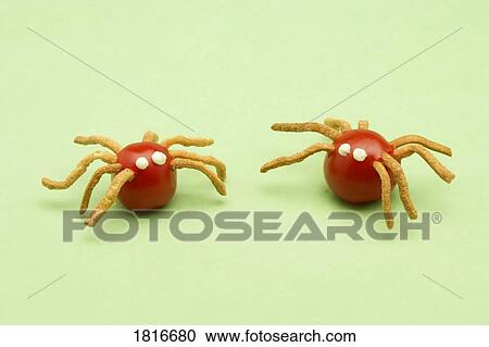 Studio shot of food shaped like spiders View Large Photo Image Stock Image - Studio shot of food shaped like spiders. Fotosearch