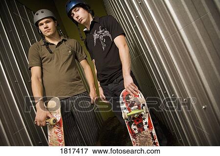 Teenage boys with skateboards View Large Photo Image Stock Photo - Teenage boys with skateboards. Fotosearch