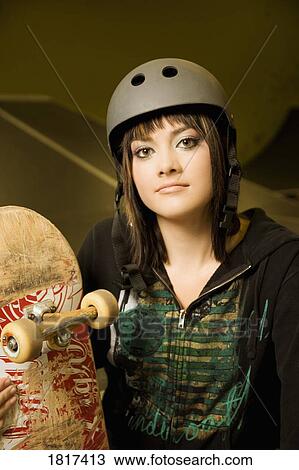 Teenage girl with skateboard View Large Photo Image Stock Image - Teenage girl with skateboard. Fotosearch
