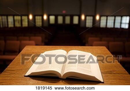 The Bible on a church podium View Large Photo Image Stock Photography - The Bible on a church podium. Fotosearch