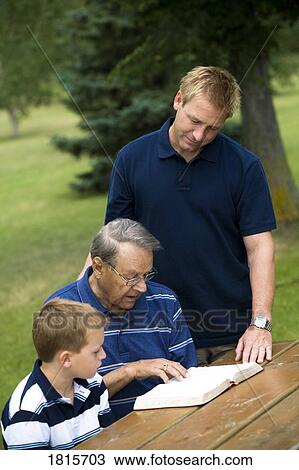 Three generations reading the Bible View Large Photo Image Stock Image - Three generations reading the Bible. Fotosearch