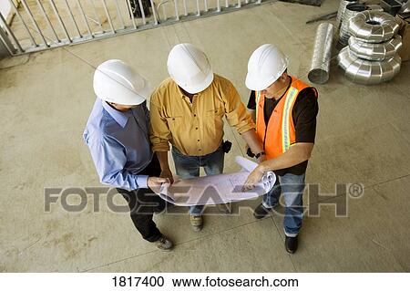 Three men with blueprint View Large Photo Image Stock Image - Three men with blueprint. Fotosearch