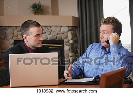 Two men having a discussion View Large Photo Image Stock Image - Two men having a discussion. Fotosearch