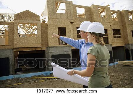 Viewing a new project View Large Photo Image Stock Photo - Viewing a new project. Fotosearch