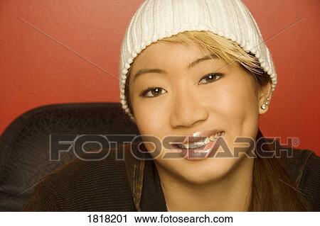 Woman wearing knit hat View Large Photo Image Stock Image - Woman wearing knit hat. Fotosearch