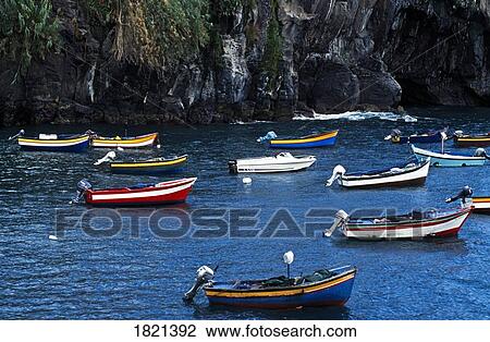 Stock Image - Anchored boats, Camara de Lobos, Madeira, Portugal. Fotosearch
