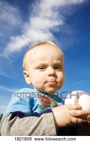 Baby with baseball View Large Photo Image Stock Photo - Baby with baseball. Fotosearch