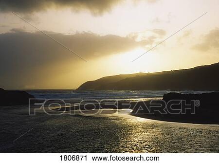 Stock Image - Barleycove at sunset, Co Cork, Ireland. Fotosearch