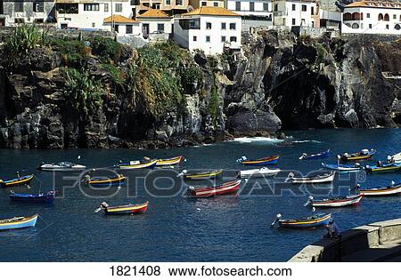 Boats anchored in Camara de Lobos, Portugal View Large Photo Image Stock Photo - Boats anchored in Camara de Lobos, Portugal. Fotosearch