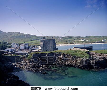 Stock Image - Clare Island harbour, Grace O'Malley Tower, Co Mayo, Ireland. Fotosearch