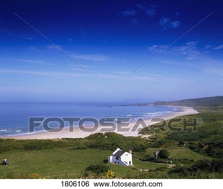 Stock Photograph - Co Antrim, Whitepark Bay and Benbane Head, Ireland. Fotosearch