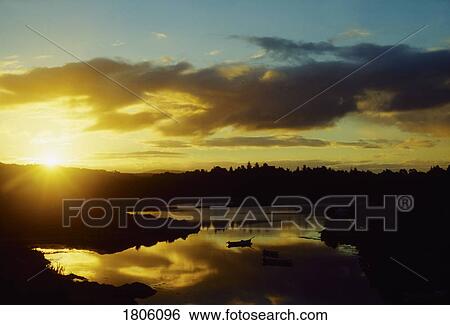Co Cork, Sunrise over Garinish Island, Glengarriff, West Cork, Ireland View Large Photo Image Stock Photograph - Co Cork, Sunrise over Garinish Island, Glengarriff, West Cork, Ireland. Fotosearch