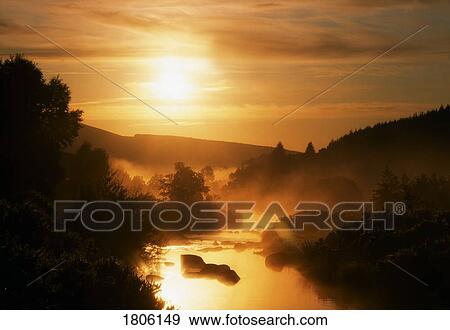 Co Wicklow, morning mist on river, Glendalough, Ireland View Large Photo Image Stock Photo - Co Wicklow, morning mist on river, Glendalough, Ireland. Fotosearch