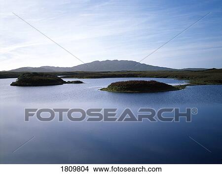 Picture - Crannog site in Roundstone, Connemara, Co Galway, Ireland. Fotosearch