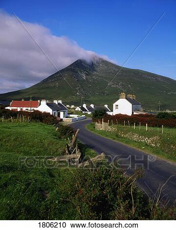 Doogort Village and Slievemore Mountain, Achill Island, County Mayo, Ireland View Large Photo Image Stock Image - Doogort Village and Slievemore Mountain, Achill Island, County Mayo, Ireland. Fotosearch