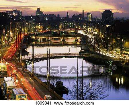 Stock Image - Evening over River Liffey towards Four Courts, Dublin, Ireland. Fotosearch