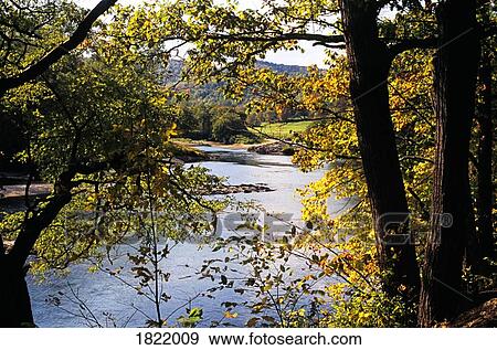 Stock Photo - Fall scene of White River, Hartford, Vermont, USA. Fotosearch