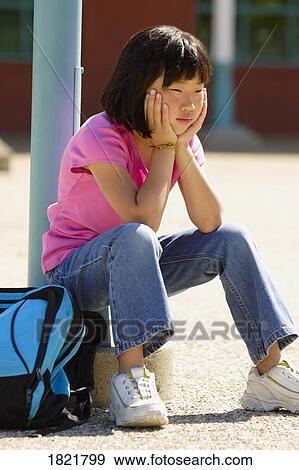 Stock Photo - Girl waiting. Fotosearch
