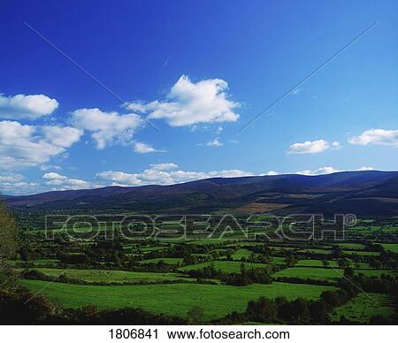 Glen of Aherlow and the Galtee Mountains, Co Tipperary, Ireland View Large Photo Image Stock Image - Glen of Aherlow and the Galtee Mountains, Co Tipperary, Ireland. Fotosearch
