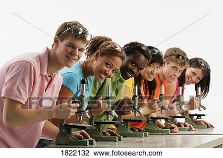 Group of teens with microscopes View Large Photo Image Stock Image - Group of teens with microscopes. Fotosearch