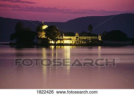 Stock Photograph - Jagmandir Palace at night, Lake Pichola, Udaipur, Rajasthan, India. Fotosearch