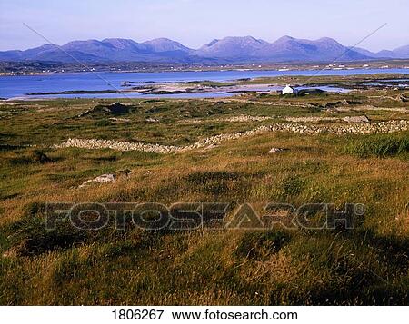 Stock Photo - Mannin Bay and mountain range, County Galway, Ireland. Fotosearch