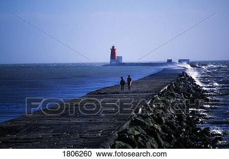 Stock Image - Poolbeg Lighthouse at Dublin Bay, Ireland. Fotosearch