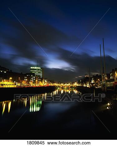 Stock Photography - River Liffey at night, Dublin, Ireland. Fotosearch