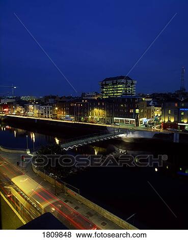 River Liffey, Millennium Footbridge and the Central Bank, Dublin, Ireland View Large Photo Image Stock Photo - River Liffey, Millennium Footbridge and the Central Bank, Dublin, Ireland. Fotosearch