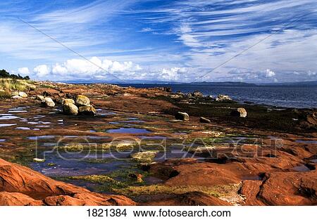 Picture - Rocky shore along the Highlands in Scotland. Fotosearch