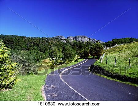 Stock Image - Rural road, Binevenagh, Co Derry, Ireland. Fotosearch