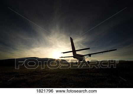 Small aircraft silhouette View Large Photo Image Stock Photograph - Small aircraft silhouette. Fotosearch