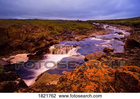 Stock Image - Stream in the arctic. Fotosearch