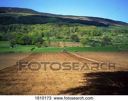 Stock Image - Tillage below Slieve Gullion, Co Armagh, Ireland. Fotosearch