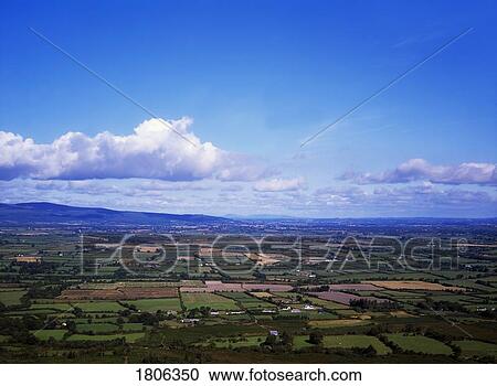 Tipperary fields from the Knockmealdown Mountains, Co Waterford, Ireland View Large Photo Image Stock Image - Tipperary fields from the Knockmealdown Mountains, Co Waterford, Ireland. Fotosearch